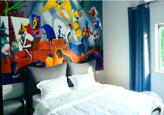 谷城对于酒店的墙体彩绘而言更注重哪些方面?